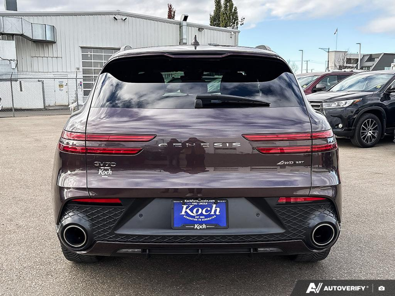 USED 2022 Genesis GV70 3.5T Sport - Dark Red Exterior - $44,925 - Stock #E51166A - VIN KMUMCDTC0NU013463 - Photo 5