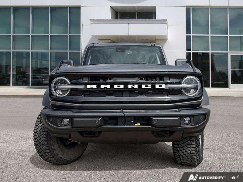 USED 2023 Ford Bronco Outer Banks - Carbonized Grey Metallic Exterior - $52,916 - Stock #E60186A - VIN 1FMEE5DP3PLB48823 - Photo 2