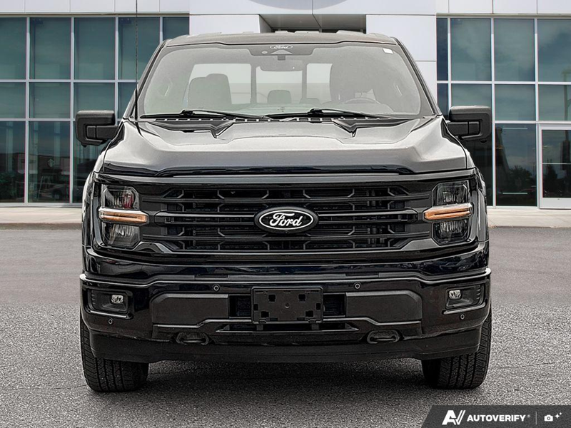 USED 2024 Ford F-150 XLT - Antimatter Blue Metallic Exterior / BLACK SPORT Interior - $57,997 - Stock #EP4735 - VIN 1FTFW3L85RFA38877 - Photo 2