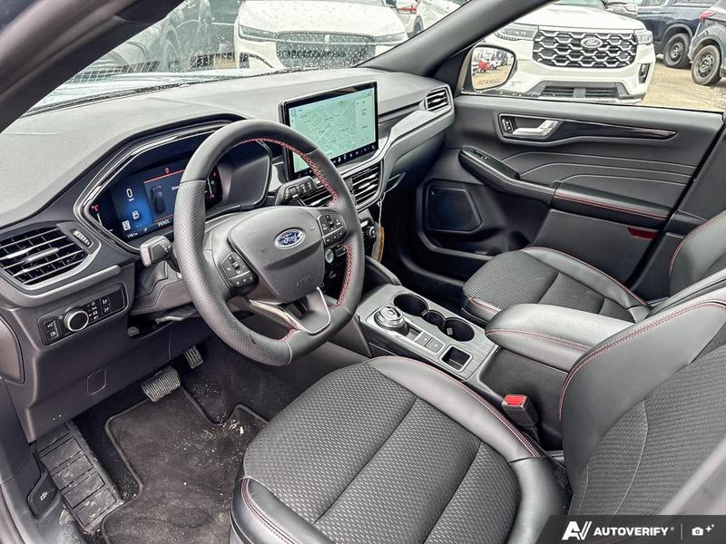 NEW 2025 Ford Escape ST-Line Hybrid - Vapor Blue Exterior / EBONY VINYL/ RED STITCHING Interior - $43,893 - Stock #E50102 - VIN 1FMCU9MZXSUA13070 - Photo 13