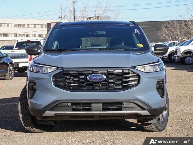 NEW 2025 Ford Escape ST-Line Hybrid - Vapor Blue Exterior / EBONY VINYL/ RED STITCHING Interior - $43,893 - Stock #E50102 - VIN 1FMCU9MZXSUA13070 - Photo 2