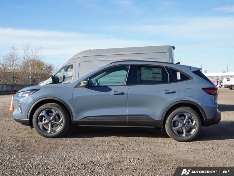 NEW 2025 Ford Escape ST-Line Hybrid - Vapor Blue Exterior / EBONY VINYL/ RED STITCHING Interior - $45,143 - Stock #E50102 - VIN 1FMCU9MZXSUA13070 - Photo 3