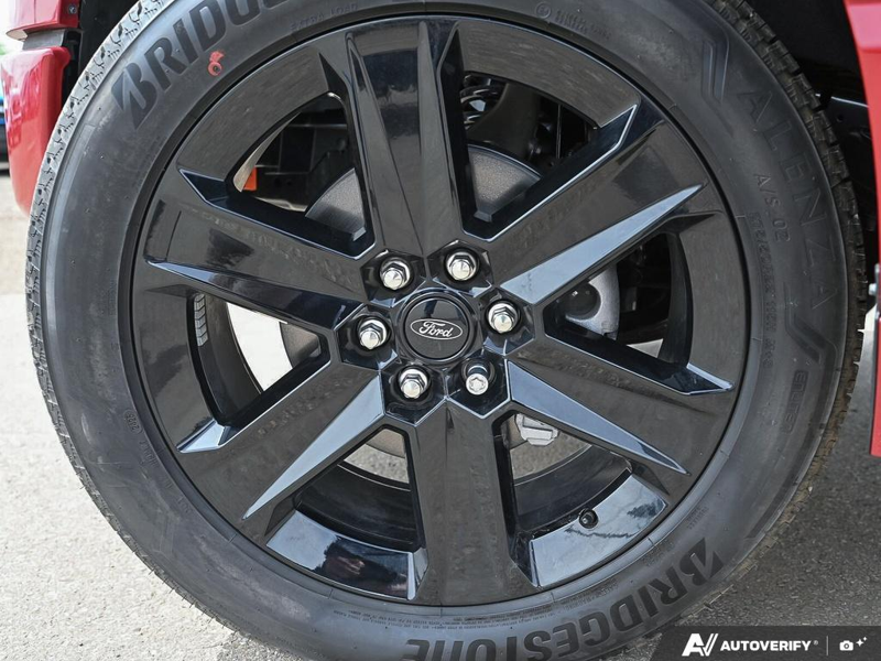NEW 2025 Ford F-150 LOBO - Rapid Red Tri-coat Metallic Exterior / BLACK STX CLOTH Interior - $61,899 - Stock #E51376 - VIN 1FTEW2L59SFC08241 - Photo 6