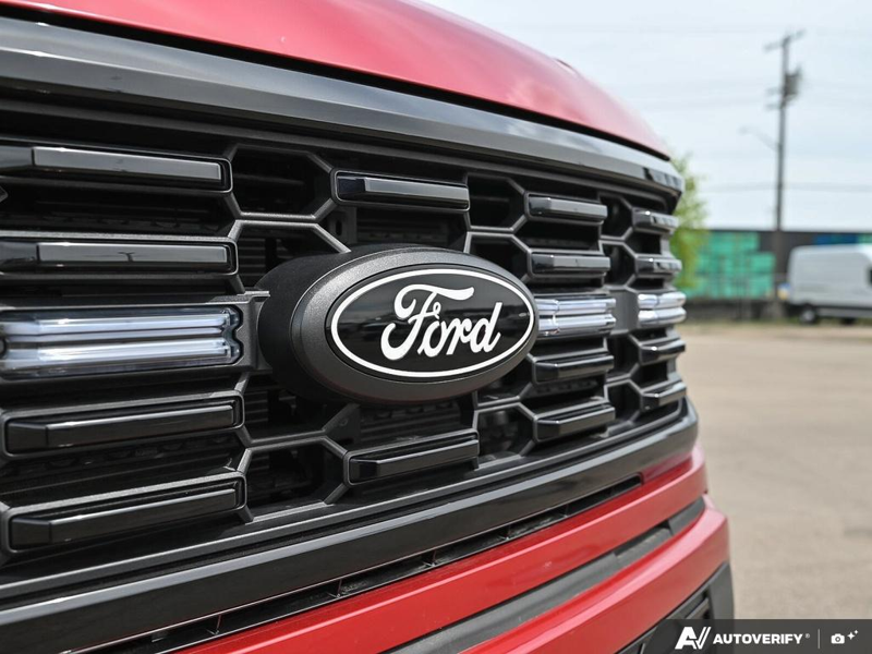 NEW 2025 Ford F-150 LOBO - Rapid Red Tri-coat Metallic Exterior / BLACK STX CLOTH Interior - $61,899 - Stock #E51376 - VIN 1FTEW2L59SFC08241 - Photo 9