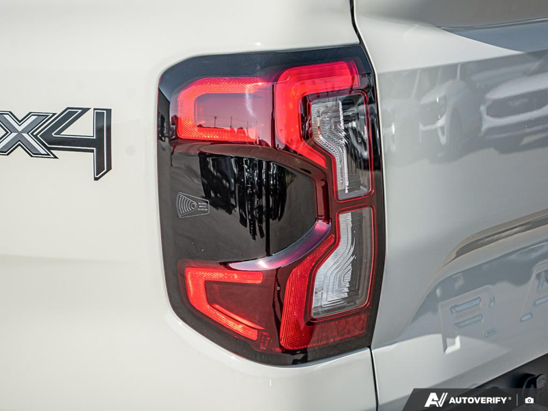 NEW 2025 Ford Ranger XLT - Desert Sand Exterior / EBONY PREMIUM CLOTH Interior - $49,974 - Stock #E51173 - VIN 1FTER4HH0SLE36409 - Photo 12