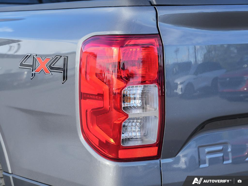 NEW 2025 Ford Ranger XL - Carbonized Grey Metallic Exterior / EBONY PREMIUM CLOTH Interior - $44,959 - Stock #E51267 - VIN 1FTER4PH3SLE51617 - Photo 12