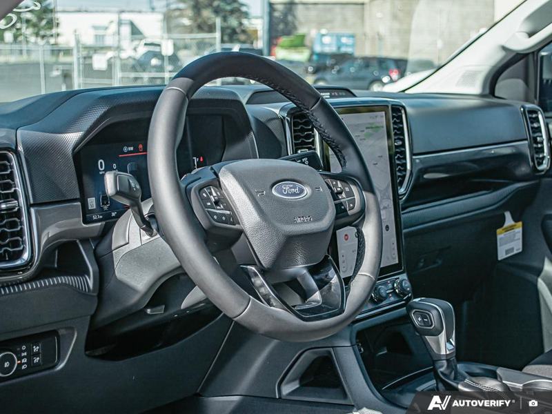 NEW 2025 Ford Ranger XLT - Desert Sand Exterior / EBONY PREMIUM CLOTH Interior - $49,974 - Stock #E51173 - VIN 1FTER4HH0SLE36409 - Photo 13