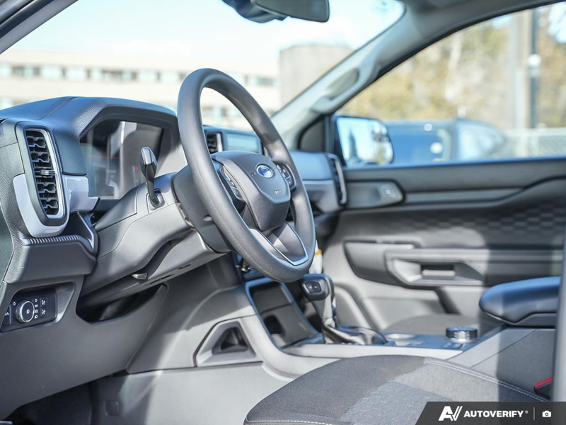 NEW 2025 Ford Ranger XL - Carbonized Grey Metallic Exterior / EBONY PREMIUM CLOTH Interior - $44,959 - Stock #E51267 - VIN 1FTER4PH3SLE51617 - Photo 13