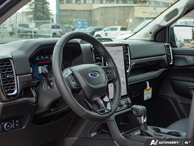 NEW 2025 Ford Ranger Lariat - Shadow Black Exterior / EBONY LEATHER-TRIMMED Interior - $55,949 - Stock #E51335 - VIN 1FTER4KH9SLE62161 - Photo 13