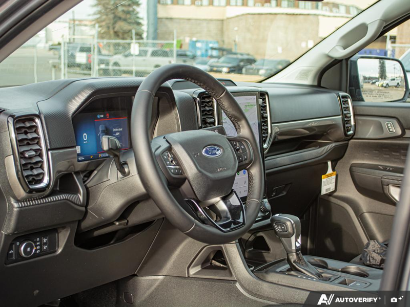 NEW 2025 Ford Ranger XLT - Carbonized Grey Metallic Exterior / EBONY PREMIUM CLOTH Interior - $49,899 - Stock #E51366 - VIN 1FTER4HH6SLE63775 - Photo 13