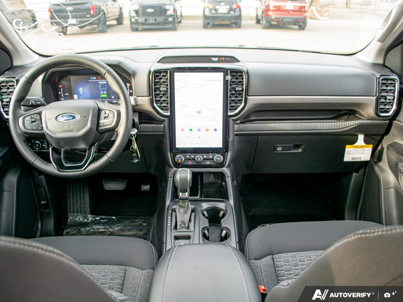 NEW 2025 Ford Ranger XLT - Carbonized Grey Metallic Exterior / EBONY PREMIUM CLOTH Interior - $49,899 - Stock #E51366 - VIN 1FTER4HH6SLE63775 - Photo 27