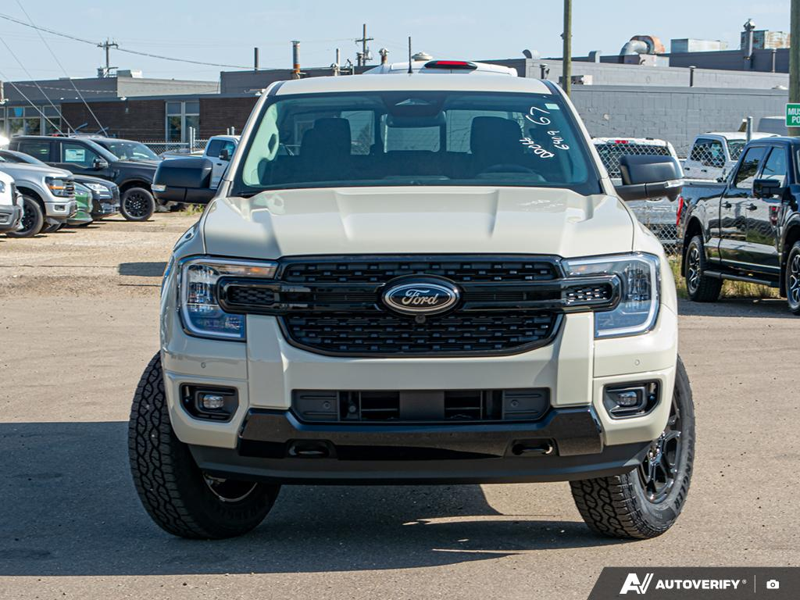 NEW 2025 Ford Ranger XLT - Desert Sand Exterior / EBONY PREMIUM CLOTH Interior - $49,974 - Stock #E51173 - VIN 1FTER4HH0SLE36409 - Photo 2