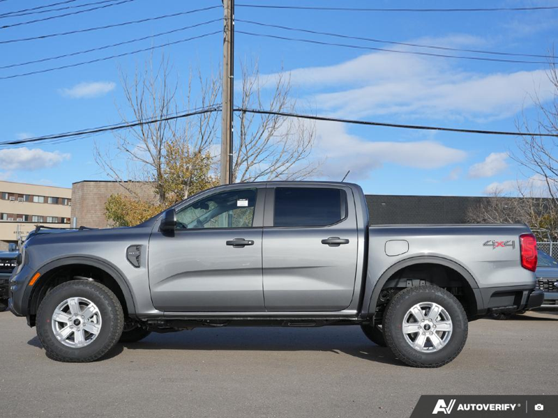 NEW 2025 Ford Ranger XL - Carbonized Grey Metallic Exterior / EBONY PREMIUM CLOTH Interior - $44,959 - Stock #E51267 - VIN 1FTER4PH3SLE51617 - Photo 2
