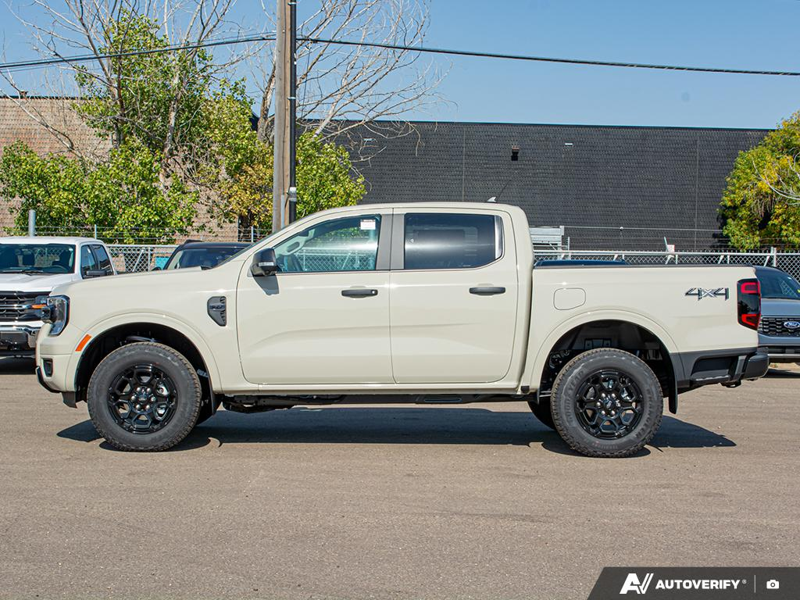 NEW 2025 Ford Ranger XLT - Desert Sand Exterior / EBONY PREMIUM CLOTH Interior - $49,974 - Stock #E51173 - VIN 1FTER4HH0SLE36409 - Photo 3