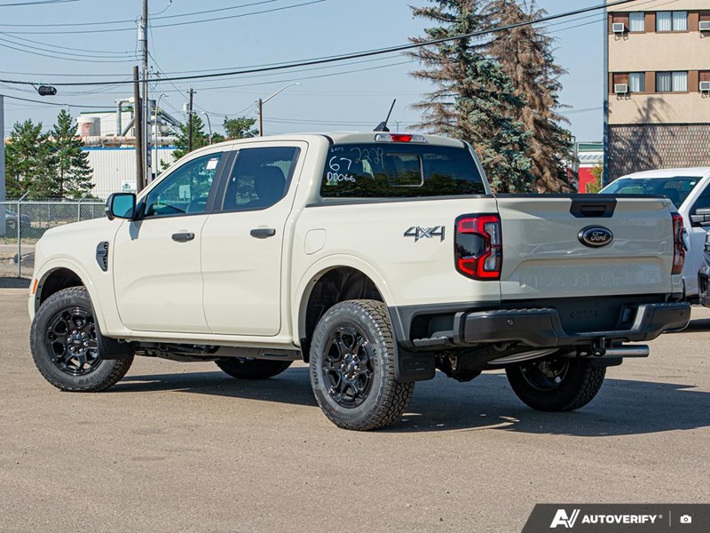 NEW 2025 Ford Ranger XLT - Desert Sand Exterior / EBONY PREMIUM CLOTH Interior - $49,974 - Stock #E51173 - VIN 1FTER4HH0SLE36409 - Photo 4