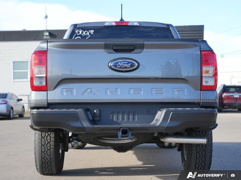 NEW 2025 Ford Ranger XL - Carbonized Grey Metallic Exterior / EBONY PREMIUM CLOTH Interior - $44,959 - Stock #E51267 - VIN 1FTER4PH3SLE51617 - Photo 4