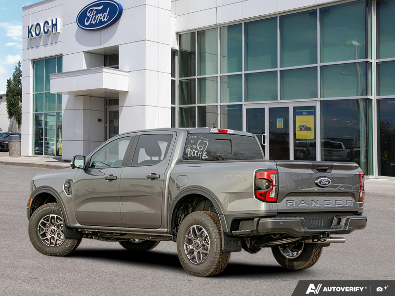 NEW 2025 Ford Ranger XLT - Carbonized Grey Metallic Exterior / EBONY PREMIUM CLOTH Interior - $49,899 - Stock #E51366 - VIN 1FTER4HH6SLE63775 - Photo 4