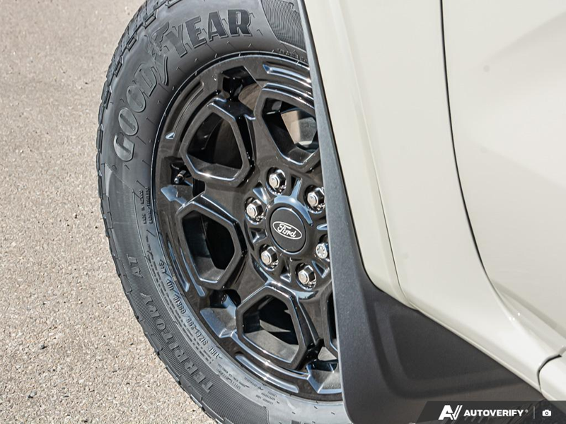 NEW 2025 Ford Ranger XLT - Desert Sand Exterior / EBONY PREMIUM CLOTH Interior - $49,974 - Stock #E51173 - VIN 1FTER4HH0SLE36409 - Photo 6