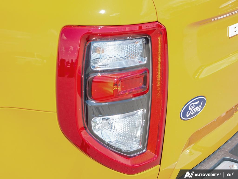 NEW 2026 Ford Bronco Sport Badlands - Orange Fury Metallic Tri-coat Exterior / DARK SPACE GREY LEATHER Interior - $51,954 - Stock #E60241 - VIN 3FMCR9DA8TRE10054 - Photo 12