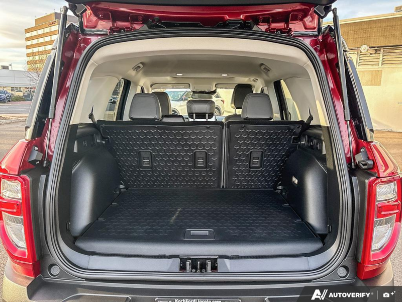 USED 2026 Ford Bronco Sport Badlands - Ruby Red Metallic Tinted Clearcoat Exterior / DARK SPACE GREY, LEATHER-TRIMMED FRONT SPORT CONTOUR BUCKET SEAT Interior - $49,959 - Stock #EP4825 - VIN 3FMCR9DA5TRE31427 - Photo 12