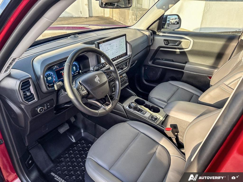 USED 2026 Ford Bronco Sport Badlands - Ruby Red Metallic Tinted Clearcoat Exterior / DARK SPACE GREY, LEATHER-TRIMMED FRONT SPORT CONTOUR BUCKET SEAT Interior - $49,959 - Stock #EP4825 - VIN 3FMCR9DA5TRE31427 - Photo 13