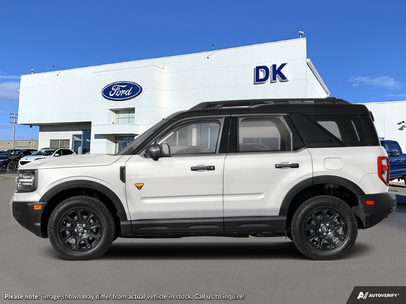 NEW 2026 Ford Bronco Sport Badlands - Oxford White Exterior / DARK SPACE GREY LEATHER Interior - $52,819 - Stock #D60807 - VIN 3FMCR9DA8TRF31909 - Photo 1