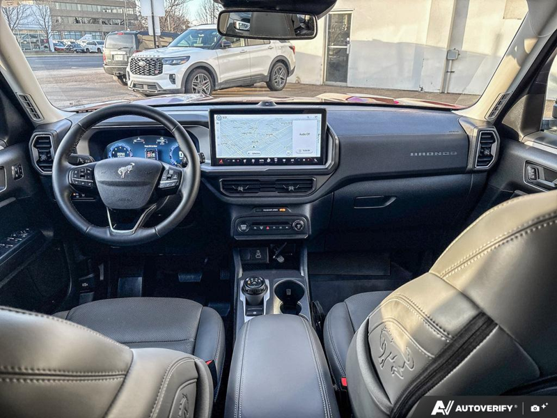 USED 2026 Ford Bronco Sport Badlands - Ruby Red Metallic Tinted Clearcoat Exterior / DARK SPACE GREY, LEATHER-TRIMMED FRONT SPORT CONTOUR BUCKET SEAT Interior - $49,959 - Stock #EP4825 - VIN 3FMCR9DA5TRE31427 - Photo 24