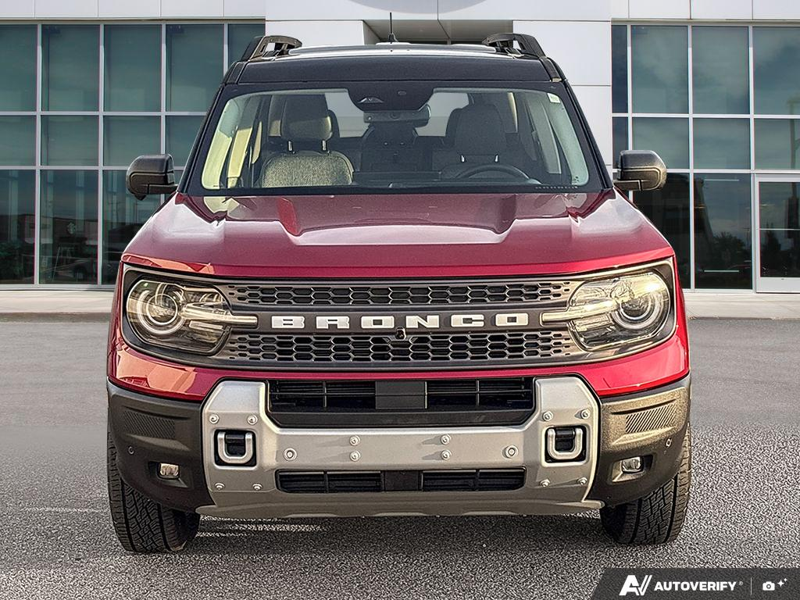 USED 2026 Ford Bronco Sport Badlands - Ruby Red Metallic Tinted Clearcoat Exterior / DARK SPACE GREY, LEATHER-TRIMMED FRONT SPORT CONTOUR BUCKET SEAT Interior - $49,959 - Stock #EP4825 - VIN 3FMCR9DA5TRE31427 - Photo 2