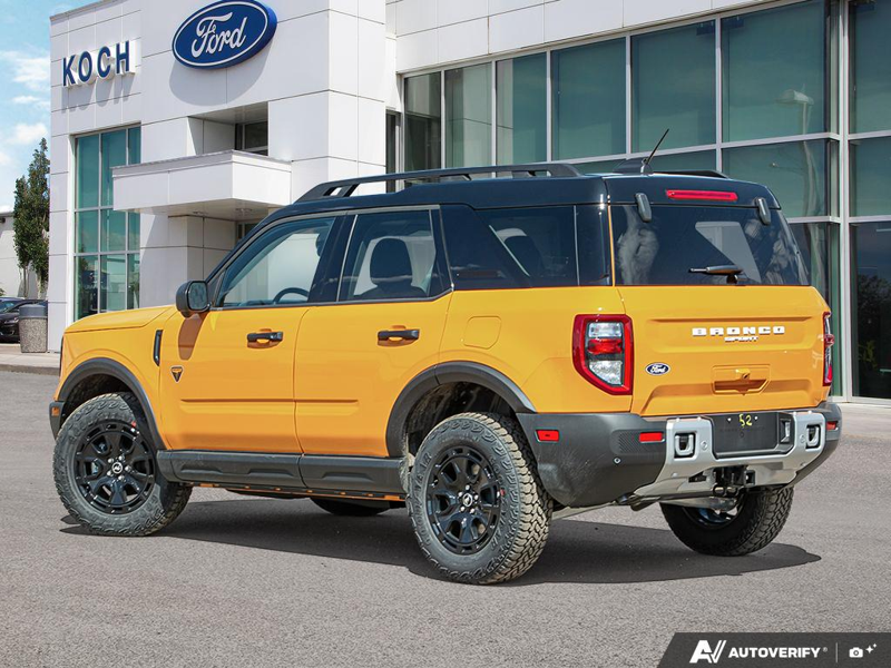 NEW 2026 Ford Bronco Sport Badlands - Orange Fury Metallic Tri-coat Exterior / DARK SPACE GREY LEATHER Interior - $51,954 - Stock #E60241 - VIN 3FMCR9DA8TRE10054 - Photo 4