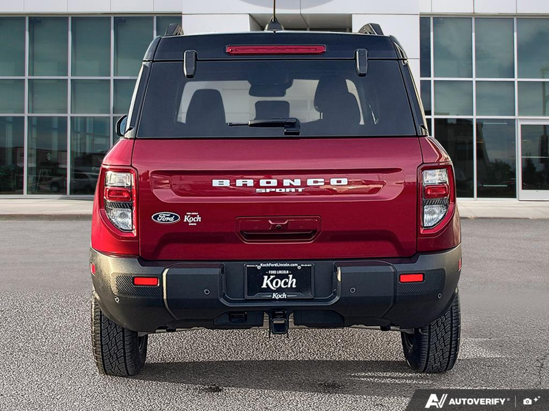 USED 2026 Ford Bronco Sport Badlands - Ruby Red Metallic Tinted Clearcoat Exterior / DARK SPACE GREY, LEATHER-TRIMMED FRONT SPORT CONTOUR BUCKET SEAT Interior - $49,959 - Stock #EP4825 - VIN 3FMCR9DA5TRE31427 - Photo 5