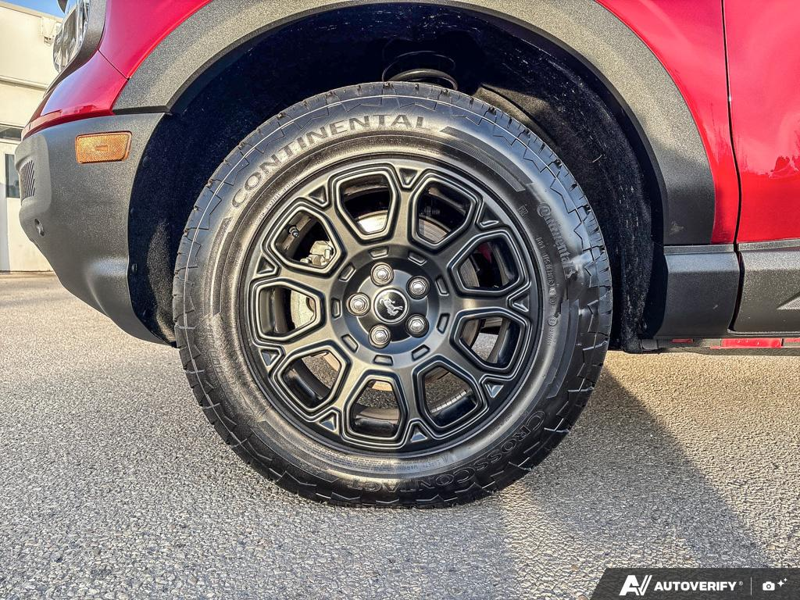 USED 2026 Ford Bronco Sport Badlands - Ruby Red Metallic Tinted Clearcoat Exterior / DARK SPACE GREY, LEATHER-TRIMMED FRONT SPORT CONTOUR BUCKET SEAT Interior - $49,959 - Stock #EP4825 - VIN 3FMCR9DA5TRE31427 - Photo 6