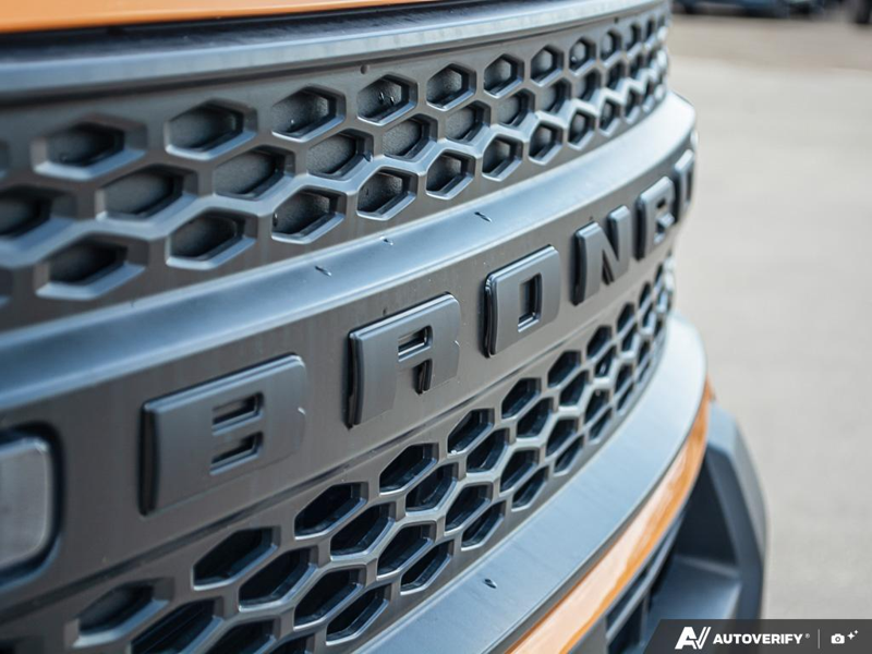 NEW 2026 Ford Bronco Sport Big Bend - Orange Fury Metallic Tri-coat Exterior / EBONY, PREMIUM TRIMMED HTD FR SPORT CONTOUR BUCKET SEATS Interior - $40,604 - Stock #E60242 - VIN 3FMCR9BN6TRE10964 - Photo 9
