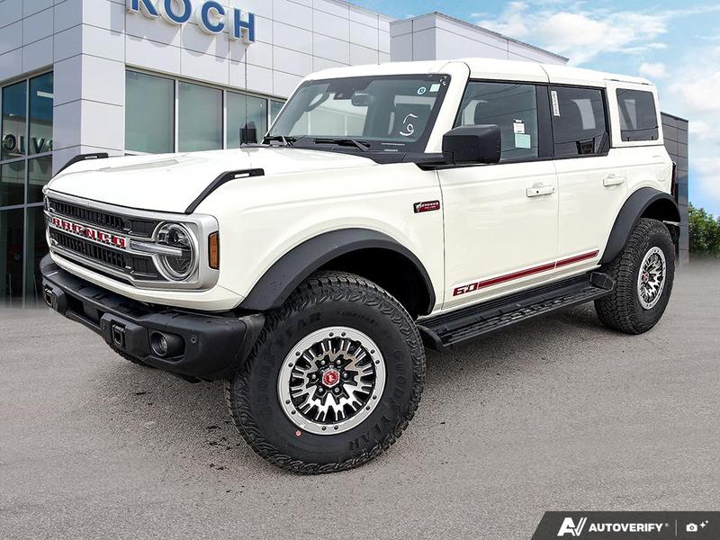 NEW 2026 Ford Bronco Outer Banks 60th Anniversary Edition - Wimbledon White Exterior / BLACK ONYX-LEATHER/VINYL Interior - $84,724 - Stock #E60186 - VIN 1FMEE8BP9TLA47123 - Photo 1
