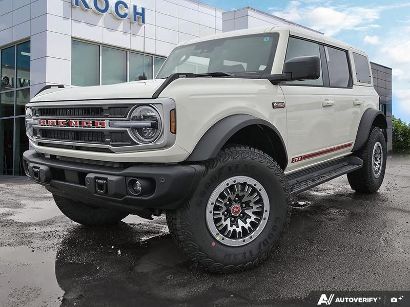 NEW 2026 Ford Bronco Outer Banks 60th Anniversary Edition - Wimbledon White Exterior / BLACK ONYX-LEATHER/VINYL Interior - $84,924 - Stock #E60477 - VIN 1FMEE8BP8TLA54032 - Photo 1