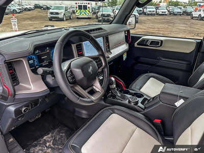 NEW 2026 Ford Bronco Outer Banks 60th Anniversary Edition - BLACK ONYX-LEATHER/VINYL Interior - $83,879 - Stock #E60681 - VIN 1FMEE8BH0TLA92542