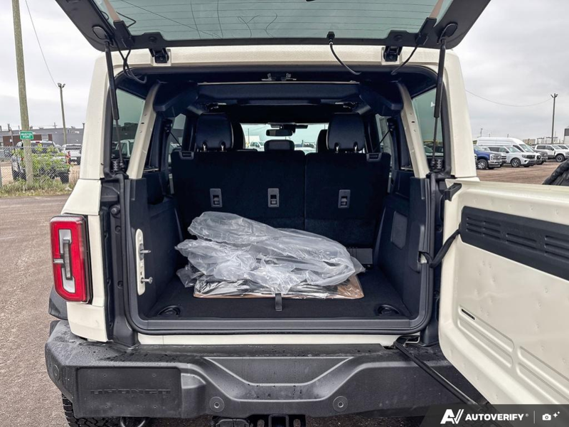 NEW 2026 Ford Bronco Outer Banks 60th Anniversary Edition - Wimbledon White Exterior / BLACK ONYX-LEATHER/VINYL Interior - $73,857 - Stock #E60681 - VIN 1FMEE8BH0TLA92542 - Photo 12