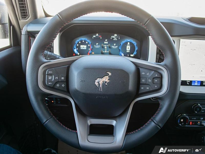 NEW 2026 Ford Bronco Heritage Edition - Ruby Red Tri-coat Metallic Exterior / BLACK ONYX-PLAID CLOTH NAVY PIER SEATS Interior - $76,259 - Stock #E60227 - VIN 1FMEE4DP9TLA42011 - Photo 14