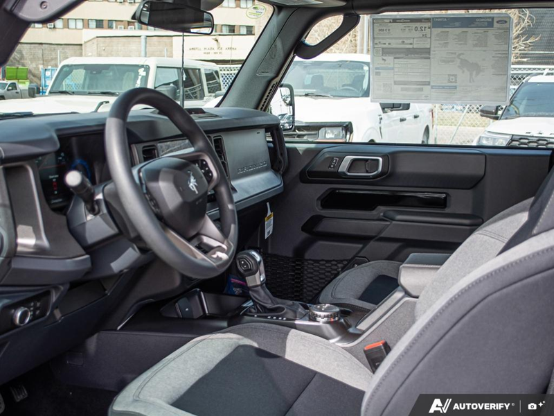 NEW 2026 Ford Bronco Base - Shadow Black Exterior / BLACK CLOTH GREY Interior - $49,937 - Stock #E60542 - VIN 1FMDE6AH9TLA76647 - Photo 13