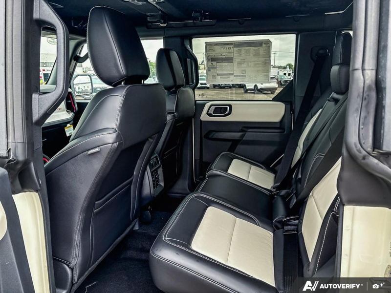 NEW 2026 Ford Bronco Outer Banks 60th Anniversary Edition - Wimbledon White Exterior / BLACK ONYX-LEATHER/VINYL Interior - $73,857 - Stock #E60681 - VIN 1FMEE8BH0TLA92542 - Photo 23