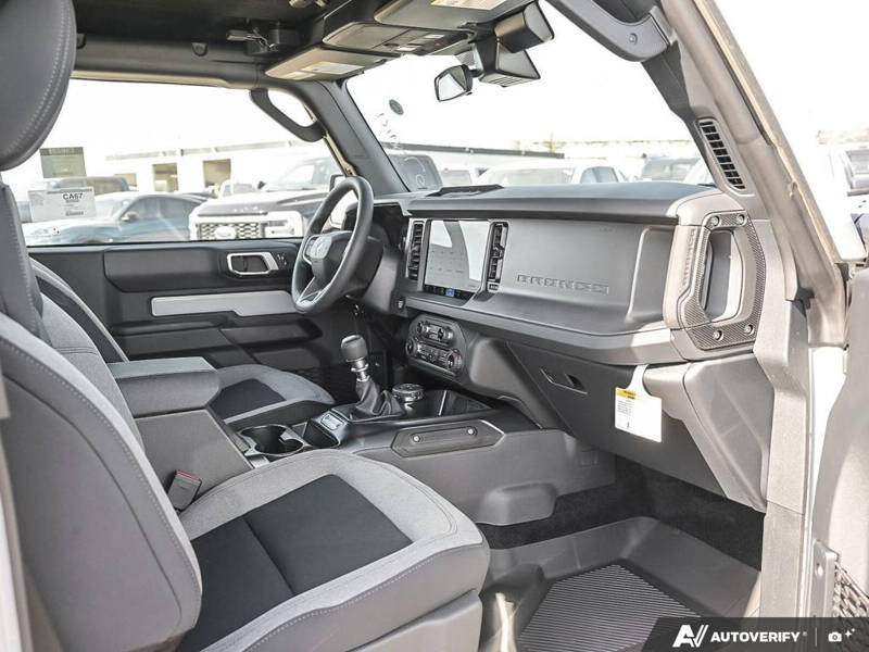 NEW 2026 Ford Bronco Base Sasquatch Manual Trans - Avalanche Exterior / BLACK CLOTH GREY Interior - $64,899 - Stock #E60239 - VIN 1FMDE6AH1TLA43559 - Photo 25