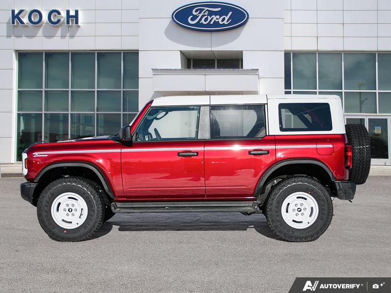 NEW 2026 Ford Bronco Heritage Edition - Ruby Red Tri-coat Metallic Exterior / BLACK ONYX-PLAID CLOTH NAVY PIER SEATS Interior - $76,259 - Stock #E60227 - VIN 1FMEE4DP9TLA42011 - Photo 3