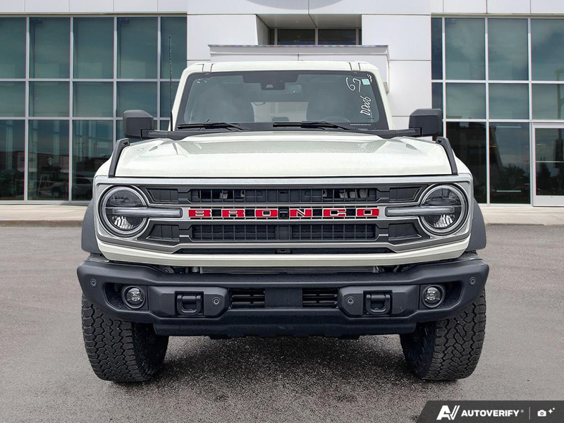NEW 2026 Ford Bronco Outer Banks 60th Anniversary Edition - Wimbledon White Exterior / BLACK ONYX-LEATHER/VINYL Interior - $73,857 - Stock #E60681 - VIN 1FMEE8BH0TLA92542 - Photo 2