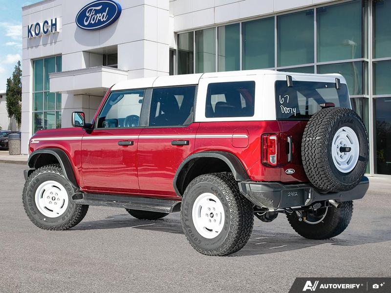 NEW 2026 Ford Bronco Heritage Edition - Ruby Red Tri-coat Metallic Exterior / BLACK ONYX-PLAID CLOTH NAVY PIER SEATS Interior - $76,259 - Stock #E60227 - VIN 1FMEE4DP9TLA42011 - Photo 4