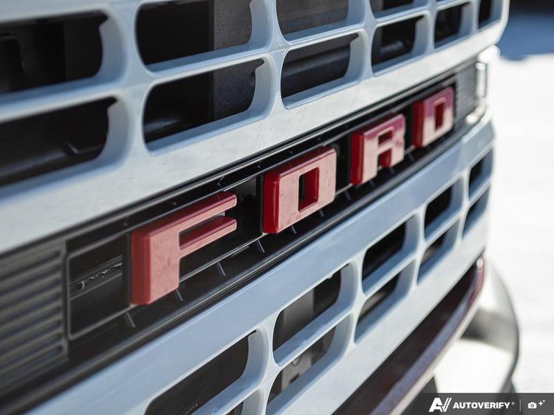 NEW 2026 Ford Bronco Heritage Edition - Ruby Red Tri-coat Metallic Exterior / BLACK ONYX-PLAID CLOTH NAVY PIER SEATS Interior - $76,259 - Stock #E60227 - VIN 1FMEE4DP9TLA42011 - Photo 9