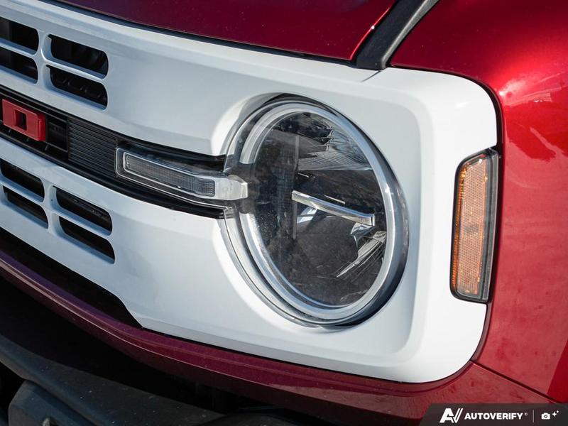 NEW 2026 Ford Bronco Heritage Edition - Ruby Red Tri-coat Metallic Exterior / BLACK ONYX-PLAID CLOTH NAVY PIER SEATS Interior - $76,259 - Stock #E60227 - VIN 1FMEE4DP9TLA42011 - Photo 10