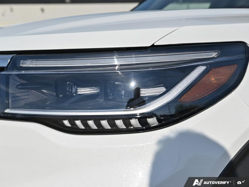 NEW 2026 Ford Explorer Platinum - Star White Tri-Coat Exterior / MOJAVE DUSK, PREM. LEATHER SEATING SURFACES SPORT CAPTAIN CHAIRS Interior - $64,348 - Stock #E61073 - VIN 1FMUK8HHXTGC46954 - Photo 10