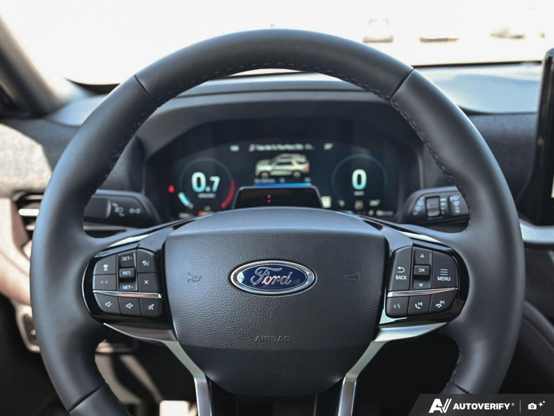 NEW 2026 Ford Explorer Platinum - Star White Tri-Coat Exterior / MOJAVE DUSK, PREM. LEATHER SEATING SURFACES SPORT CAPTAIN CHAIRS Interior - $64,348 - Stock #E61073 - VIN 1FMUK8HHXTGC46954 - Photo 14