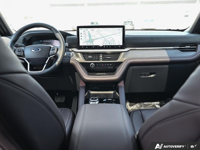 NEW 2026 Ford Explorer Platinum - Star White Tri-Coat Exterior / MOJAVE DUSK, PREM. LEATHER SEATING SURFACES SPORT CAPTAIN CHAIRS Interior - $64,348 - Stock #E61073 - VIN 1FMUK8HHXTGC46954 - Photo 25