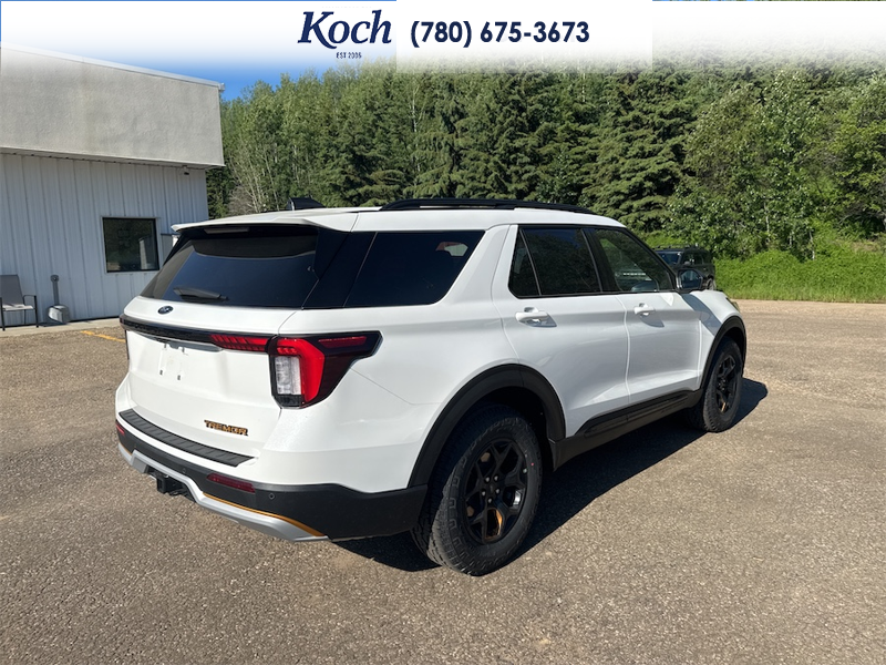 NEW 2026 Ford Explorer Tremor - Star White Tri-Coat Exterior / ONYX, HEAT/VENTILATED MIKO SUEDE SPORT CAPTAIN'S CHAIRS Interior - $66,780 - Stock #A26207 - VIN 1FMUK8JH7TGB86660 - Photo 2