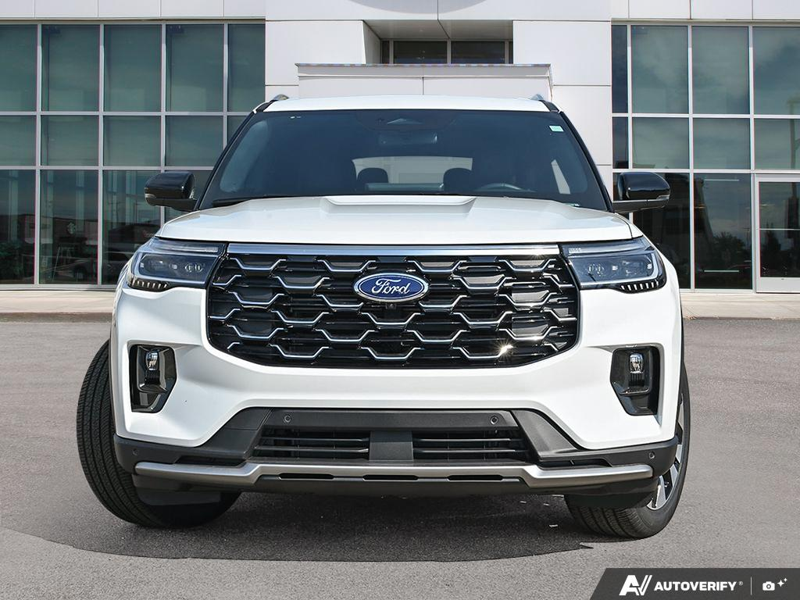 NEW 2026 Ford Explorer Platinum - Star White Tri-Coat Exterior / MOJAVE DUSK, PREM. LEATHER SEATING SURFACES SPORT CAPTAIN CHAIRS Interior - $64,348 - Stock #E61073 - VIN 1FMUK8HHXTGC46954 - Photo 2